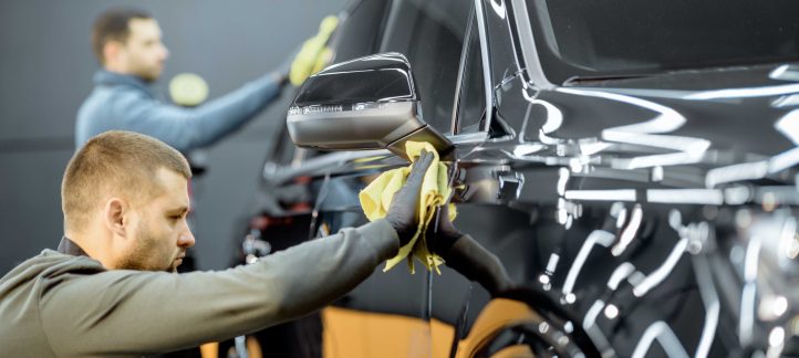 two professional exterior detailing worker